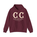 Maroon Clay City Nine hoodie featuring vintage baseball team logo and classic kangaroo pocket design.