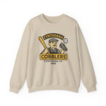 Beige crewneck sweatshirt featuring Cynthiana Cobblers vintage baseball team logo from 1909 Kentucky minor league.