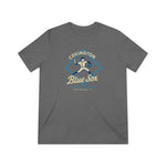 Gray Covington Blue Sox tri-blend t-shirt with vintage baseball player graphic and text on front