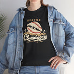 Seattle Clamdiggers Heavyweight T-Shirt in black with the Seattle Clamdiggers logo, a clam shell made from a baseball half-buried in a tide flat on the front, worn by model