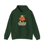 Bradenton Growers Hoodie in forest green with the smirking crowned orange character swinging a bat over a baseball on the front