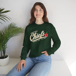 Wenatchee Chiefs Crewneck Sweatshirt in forest green with the Wenatchee Chiefs logo, script lettering with an apple stitched like a baseball on the front, worn by model