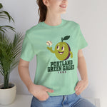 Portland Green Gages Premium Lightweight T-Shirt in mint with the Portland Green Gages logo, a cartoon green plum tossing a baseball on the front, worn by model