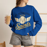 St. Petersburg Saints Crewneck Sweatshirt in royal with the cream winged baseball emblem with a halo on the front, worn by model
