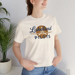Lakeland Pilots Premium Lightweight T-Shirt in natural with the airplane propeller nose art over bold navy block lettering on the front, worn by model