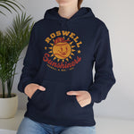 Roswell Sunshiners Hoodie in navy with the Roswell Sunshiners logo, a smiling baseball sun in a red cap, with Sunshiners in red script on the front, worn by model