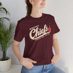 Wenatchee Chiefs Premium Lightweight T-Shirt in maroon with the Wenatchee Chiefs logo, script lettering with an apple stitched like a baseball on the front, worn by model