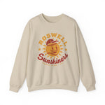 Roswell Sunshiners Crewneck Sweatshirt in sand with the Roswell Sunshiners logo, a smiling baseball sun in a red cap, with Sunshiners in red script on the front