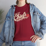 Wenatchee Chiefs Heavyweight T-Shirt in cardinal red with the Wenatchee Chiefs logo, script lettering with an apple stitched like a baseball on the front, worn by model