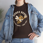 Bisbee Bees Heavyweight T-Shirt in dark chocolate with the Bisbee Bees logo, a cartoon bee in a ball cap catching a baseball on the front, worn by model