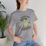 Sanford Celeryfeds Premium Lightweight T-Shirt in athletic heather with the green cartoon celery stalk mascot swinging a bat on the front, worn by model