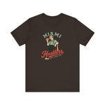 Miami Hustlers Premium Lightweight T-Shirt in brown with the mustached man in a striped vest holding playing cards and a bat on the front