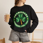Roseburg Shamrocks Crewneck Sweatshirt in black with the Roseburg Shamrocks logo, a shamrock of baseballs with a bat stem in a green ring on the front, worn by model