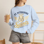 St. Petersburg Saints Crewneck Sweatshirt in light blue with the cream winged baseball emblem with a halo on the front, worn by model
