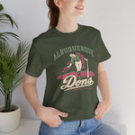 Albuquerque Dons Premium Lightweight T-Shirt in military green with the Albuquerque Dons logo, a caped ballplayer bowing with his hat swept off in front of pink mountains, with Dons in cream script on the front, worn by model