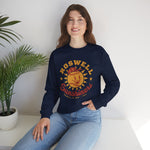 Roswell Sunshiners Crewneck Sweatshirt in navy with the Roswell Sunshiners logo, a smiling baseball sun in a red cap, with Sunshiners in red script on the front, worn by model