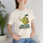 Portland Green Gages Premium Lightweight T-Shirt in natural with the Portland Green Gages logo, a cartoon green plum tossing a baseball on the front, worn by model