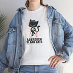 Aberdeen Black Cats Heavyweight T-Shirt in white with the Aberdeen Black Cats logo, a black cat in a green cap and jersey sitting on a baseball holding a bat on the front, worn by model