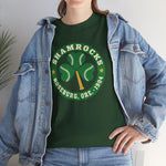 Roseburg Shamrocks Heavyweight T-Shirt in forest green with the Roseburg Shamrocks logo, a shamrock of baseballs with a bat stem in a green ring on the front, worn by model