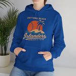 Daytona Beach Islanders Hoodie in royal with the orange sunset behind a palm island with stitched baseball waves on the front, worn by model