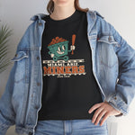 Miami Miners Heavyweight T-Shirt in black with the Miami Miners logo, a smiling ore cart holding a bat on a mine track on the front, worn by model