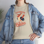Clearwater Pelicans Heavyweight T-Shirt in sand with the navy and orange pelican holding a baseball in its beak and a bat on the front, worn by model