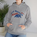 Blue Mountain Bears Hoodie in sport grey with the Blue Mountain Bears logo, a snarling bear below a red mountain peak on the front, worn by model