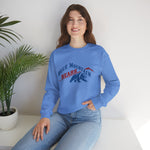 Blue Mountain Bears Crewneck Sweatshirt in carolina blue with the Blue Mountain Bears logo, a snarling bear below a red mountain peak on the front, worn by model