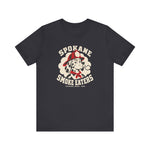 Spokane Smoke Eaters Premium Lightweight T-Shirt in dark grey with the Spokane Smoke Eaters logo, a Dalmatian in a red fire helmet and bandana blowing smoke on the front