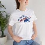 Blue Mountain Bears Premium Lightweight T-Shirt in white with the Blue Mountain Bears logo, a snarling bear below a red mountain peak on the front, worn by model
