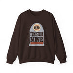 Tombstone Nine Crewneck Sweatshirt in dark chocolate with the Tombstone Nine logo, a grey headstone topped by a baseball marked 1890, with Base Ball Club and a Territorial Champions banner on the front