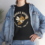 Bisbee Bees Heavyweight T-Shirt in black with the Bisbee Bees logo, a cartoon bee in a ball cap catching a baseball on the front, worn by model