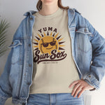 Yuma Sun Sox Heavyweight T-Shirt in sand with the Yuma Sun Sox logo, a smiling baseball sun wearing sunglasses on the front, worn by model