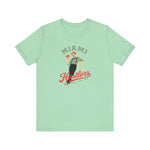 Miami Hustlers Premium Lightweight T-Shirt in mint with the mustached man in a striped vest holding playing cards and a bat on the front