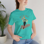 Miami Hustlers Premium Lightweight T-Shirt in teal with the mustached man in a striped vest holding playing cards and a bat on the front, worn by model
