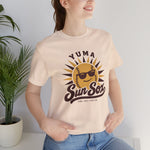 Yuma Sun Sox Premium Lightweight T-Shirt in soft cream with the Yuma Sun Sox logo, a smiling baseball sun wearing sunglasses on the front, worn by model