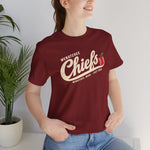Wenatchee Chiefs Premium Lightweight T-Shirt in cardinal with the Wenatchee Chiefs logo, script lettering with an apple stitched like a baseball on the front, worn by model