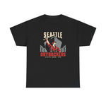 Seattle Drydockers Heavyweight T-Shirt in black with the Seattle Drydockers logo, a shipyard worker raising a bat in front of a ship in drydock on the front