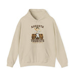 Augusta Tourists Hoodie in sand with the cartoon ballplayer with a bat standing on a travel trunk on the front