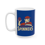 White ceramic mug featuring Greenville Spinners baseball player logo on a blue background, available in 11oz and 15oz sizes.