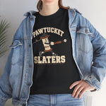 Pawtucket Slaters Heavyweight T-Shirt in black with the Pawtucket Slaters logo, a cotton mill bobbin character in a ball cap swinging a bat, with a loose thread trailing behind on the front, worn by model