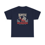 Seattle Drydockers Heavyweight T-Shirt in navy with the Seattle Drydockers logo, a shipyard worker raising a bat in front of a ship in drydock on the front