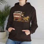 Clovis Pioneers Hoodie in dark chocolate with the Clovis Pioneers logo, a ballplayer with a raised bat riding a horse-drawn covered wagon, with Pioneers on the canvas on the front, worn by model