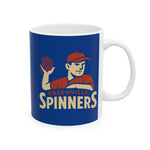 White ceramic mug with Greenville Spinners baseball player logo in red and beige on blue background
