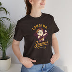 Lansing Senators Premium Lightweight T-Shirt in brown with the laurel crowned boy tossing a baseball inside a maroon diamond on the front, worn by model