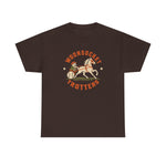 Woonsocket Trotters Heavyweight T-Shirt in dark chocolate with the Woonsocket Trotters logo, a harness racing driver in a baseball cap behind a trotting horse, the sulky wheel drawn as a baseball on the front