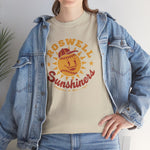 Roswell Sunshiners Heavyweight T-Shirt in sand with the Roswell Sunshiners logo, a smiling baseball sun in a red cap, with Sunshiners in red script on the front, worn by model