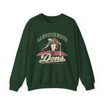 Albuquerque Dons Crewneck Sweatshirt in forest green with the Albuquerque Dons logo, a caped ballplayer bowing with his hat swept off in front of pink mountains, with Dons in cream script on the front