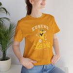 Eugene Larks Premium Lightweight T-Shirt in mustard with the Eugene Larks logo, a cartoon meadowlark with a bat and a baseball on the front, worn by model