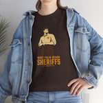West Palm Beach Sheriffs Heavyweight T-Shirt in dark chocolate with the cream cartoon sheriff holding two bats on the front, worn by model